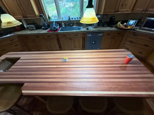 Butcher block island top installed in a kitchen