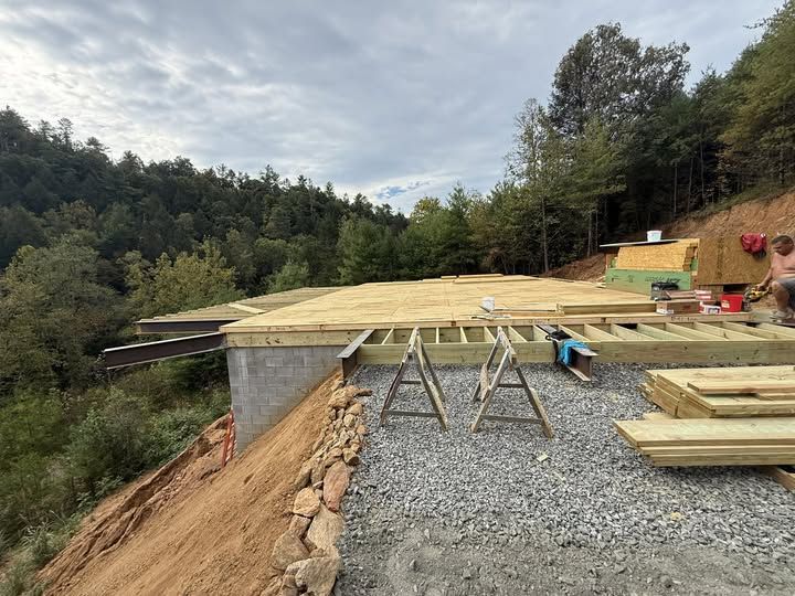 Floor framing on a steep lot with mountain views
