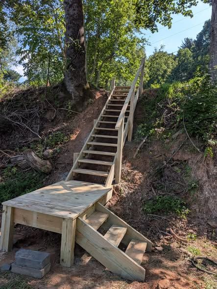 Finished hillside stairs with a landing and lower steps