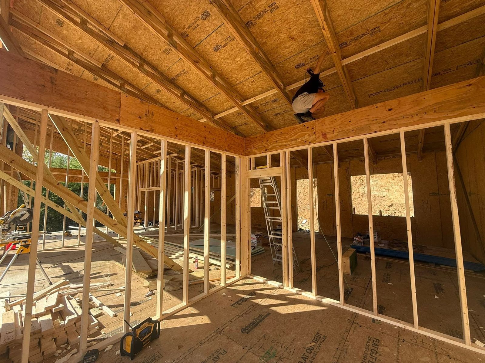 Interior walls framed under a vaulted ceiling