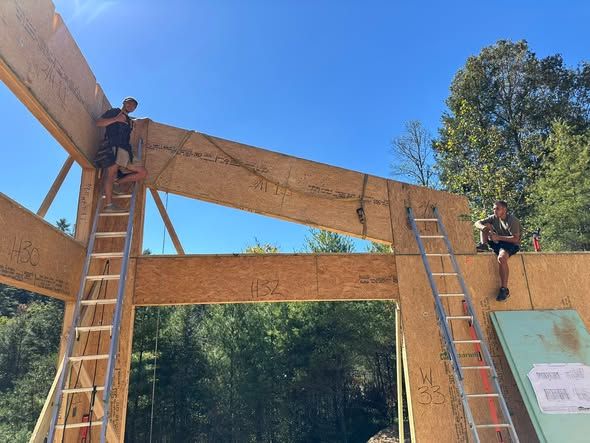 Setting roof beams on a new build