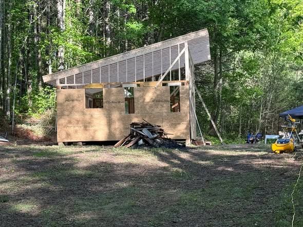 Small cabin framing in the woods